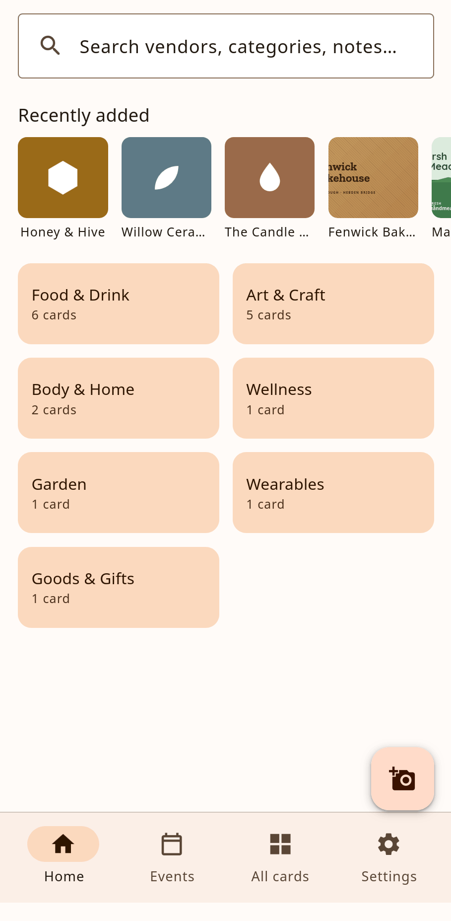 The Gathered home screen: a search box, a row of recently added vendors, and category tiles — Food & Drink, Art & Craft, Body & Home, Wellness, Garden, Wearables, Goods & Gifts — with a camera button to add a card.